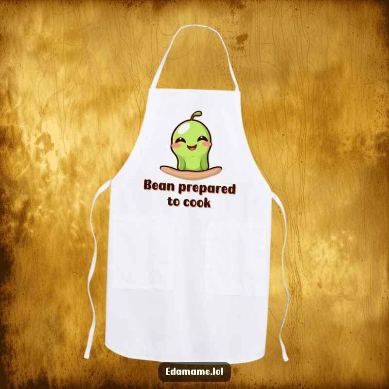 Funny edamame apron showing a single green bean peeking out with a wide, happy grin, perfect for a humorous and practical kitchen accessory.