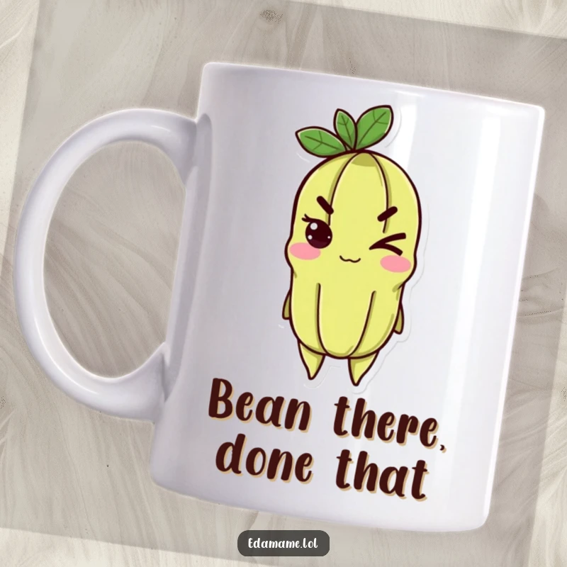 Funny edamame mug featuring a cheerful character giving a determined wink, radiating playful confidence and fun.
