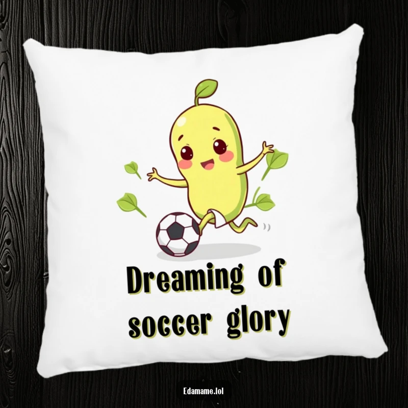 Funny pillow design of a cheerful edamame bean in the process of kicking a tiny soccer ball.