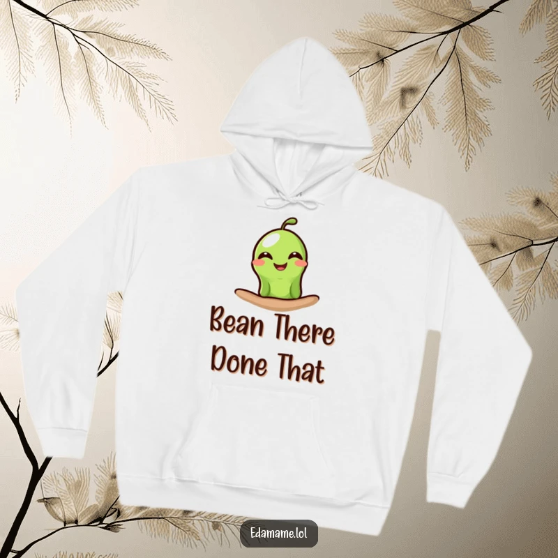 Funny edamame hoodie with a single green bean peeking out and sporting a wide, happy grin, offering warmth and humorous comfort.