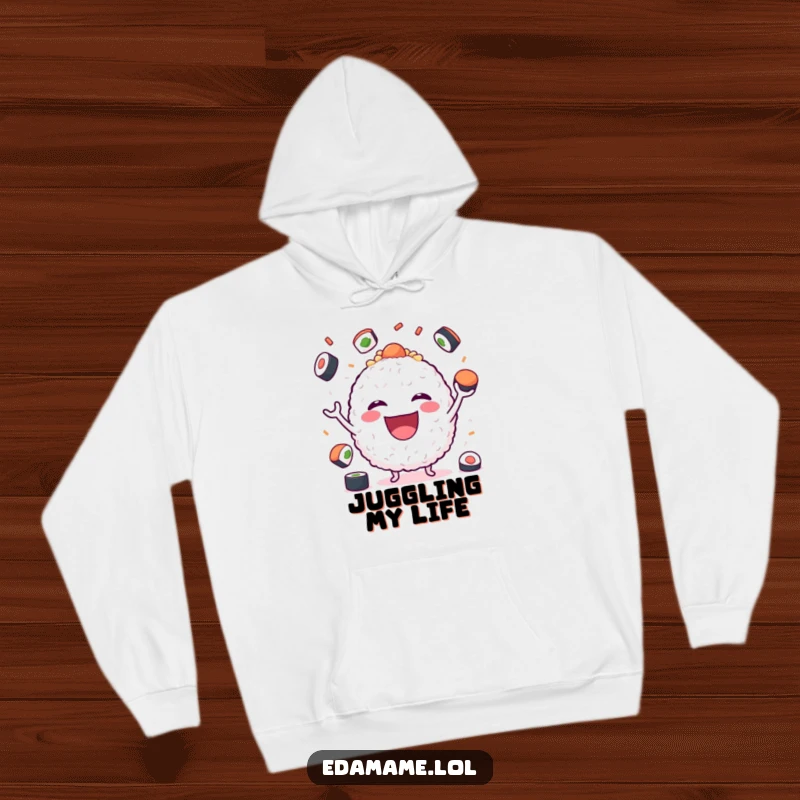 Funny Hoodie depicting a smiling rice ball juggling sushi pieces, a cozy and humorous apparel choice.