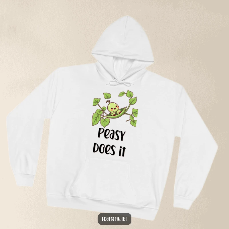 Funny pea pod hoodie showcasing a cheerful anthropomorphic pod joyfully sliding down a leafy vine, radiating pure happiness.