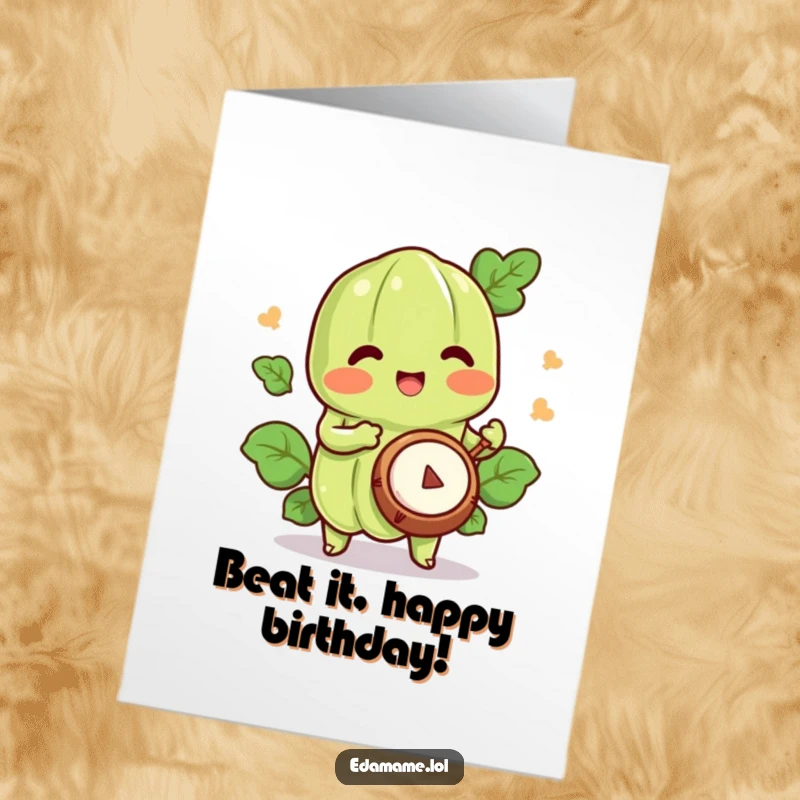 Funny Free Printable Birthday Card showing a happy edamame character enthusiastically playing a tiny drum, celebrating a joyous occasion.