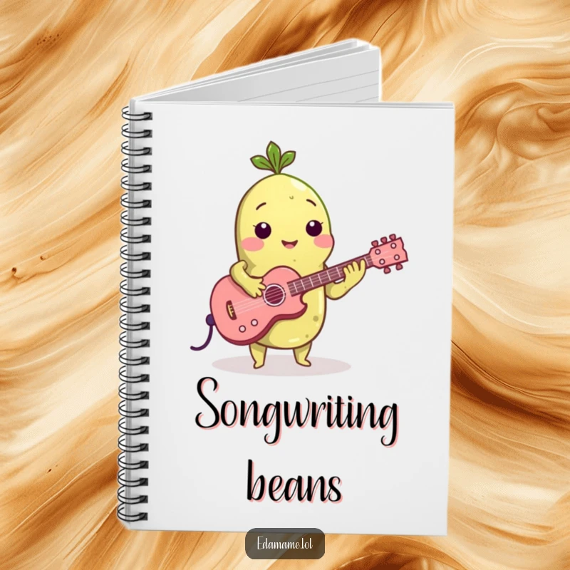 Funny notebook featuring an edamame bean playing a small guitar, ready to help you jot down your musical masterpieces.