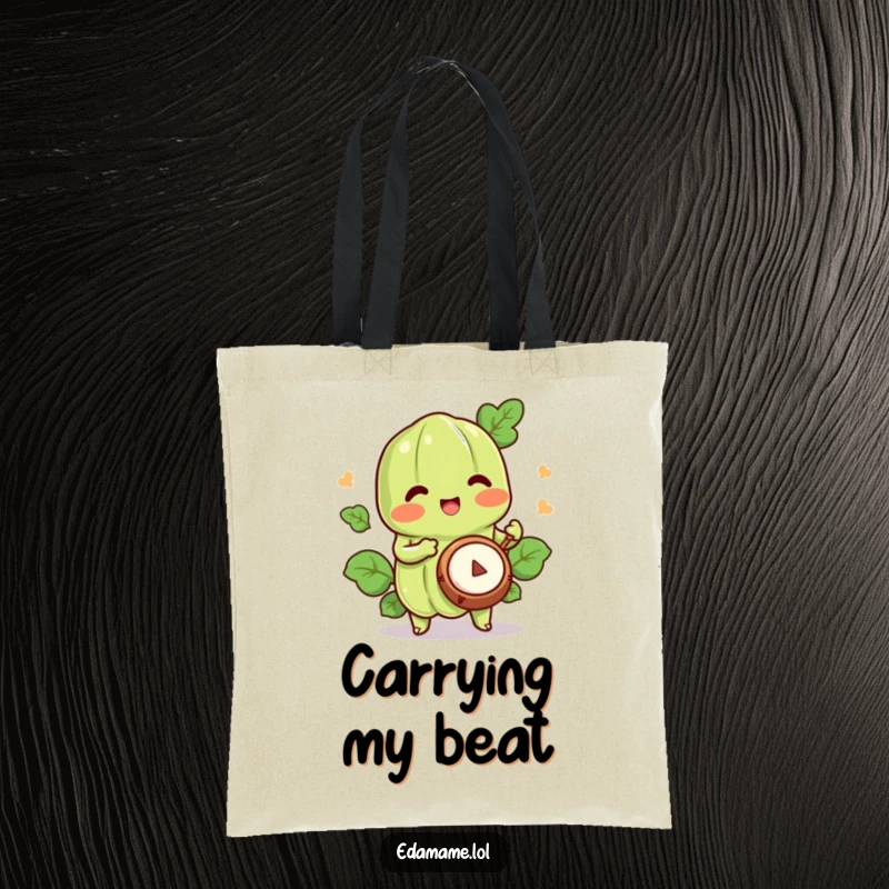Funny edamame tote bag showing a happy character playing a tiny drum, perfect for music-loving carriers.